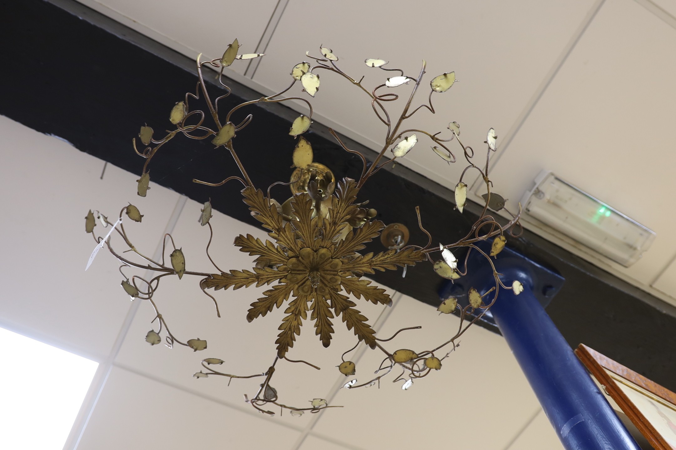 An Italian gilt metal ceiling light with leaf decoration